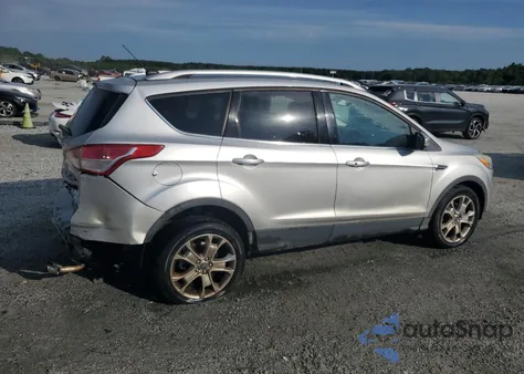 2015 Ford Escape Titanium z USA, uszkodzony, nr VIN 1FMCU0J9XFUA32711